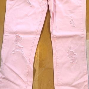 Pale pink skinny jeans with rips, size 5 , lightweight, good condition